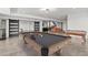Basement game room with a pool table and foosball at 1082 W Meadow Rd, Evergreen, CO 80439