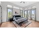 Spacious bedroom with wood floors and mountain views at 1082 W Meadow Rd, Evergreen, CO 80439