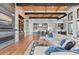 Open concept living room and kitchen with hardwood floors at 1082 W Meadow Rd, Evergreen, CO 80439