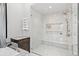 Elegant bathroom with a large walk-in shower and marble finishes at 1082 W Meadow Rd, Evergreen, CO 80439