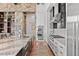 Gourmet kitchen with double ovens and expansive countertops at 1082 W Meadow Rd, Evergreen, CO 80439