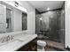 Modern bathroom with marble vanity and a large glass shower at 1082 W Meadow Rd, Evergreen, CO 80439