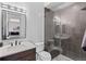 Modern bathroom with a walk-in shower and floating vanity at 1082 W Meadow Rd, Evergreen, CO 80439