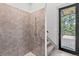 Walk-in shower with access to deck and stairs at 1082 W Meadow Rd, Evergreen, CO 80439