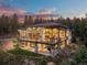 Luxury home featuring multiple levels and outdoor living spaces at 1082 W Meadow Rd, Evergreen, CO 80439
