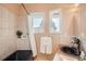 Bathroom with black bathtub, shower, and updated sink at 3001 Eagle Ridge Rd, Longmont, CO 80503