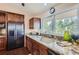 Kitchen features granite countertops and a large sink at 3001 Eagle Ridge Rd, Longmont, CO 80503