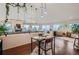 Open concept dining area with hardwood floors and scenic views at 3001 Eagle Ridge Rd, Longmont, CO 80503
