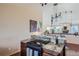 Granite kitchen island with cooktop and modern cabinetry at 3001 Eagle Ridge Rd, Longmont, CO 80503