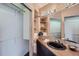 Bathroom featuring a black sink and built-in shelving at 3001 Eagle Ridge Rd, Longmont, CO 80503