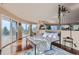 Main bedroom with hardwood floors and access to private deck at 3001 Eagle Ridge Rd, Longmont, CO 80503