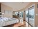 Spacious main bedroom with hardwood floors and access to deck at 3001 Eagle Ridge Rd, Longmont, CO 80503