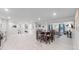 Finished basement with kitchenette, dining area, and living space at 3067 S Holly Pl, Denver, CO 80222