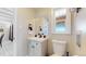 Updated bathroom with a vanity and a toilet at 3067 S Holly Pl, Denver, CO 80222