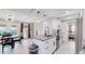 Updated kitchen features granite countertops and stainless steel appliances at 3067 S Holly Pl, Denver, CO 80222