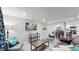 Finished basement living room with TV and comfortable seating at 3067 S Holly Pl, Denver, CO 80222