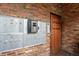 Secure mailboxes and building entry with brick facade at 1350 Josephine St # 401, Denver, CO 80206