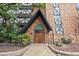 Brick building exterior with a grand entrance and landscaping at 1350 Josephine St # 401, Denver, CO 80206