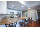 Eat-in kitchen with granite countertops and breakfast bar at 6000 W Floyd Ave # 107, Denver, CO 80227