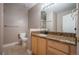 Bathroom with granite countertop and shower at 6000 W Floyd Ave # 107, Denver, CO 80227
