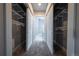 Spacious walk-in closets with built-in shelving at 6000 W Floyd Ave # 107, Denver, CO 80227