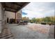 Private patio with seating area and view at 6000 W Floyd Ave # 107, Denver, CO 80227