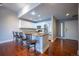 Modern kitchen with granite countertops and stainless steel appliances at 6000 W Floyd Ave # 107, Denver, CO 80227
