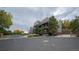 Condo building exterior view from a distance at 6000 W Floyd Ave # 107, Denver, CO 80227