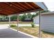Covered patio area overlooking the backyard at 177 Wolff St, Denver, CO 80219
