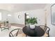 Small dining area with a view into the living room at 177 Wolff St, Denver, CO 80219