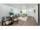 Open living and dining area with hardwood floors at 177 Wolff St, Denver, CO 80219