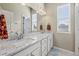 Shared bathroom with double sinks and tile flooring at 10790 E 163Rd Ct, Brighton, CO 80602