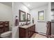 Bathroom with double vanity and granite countertop at 10869 E Crestridge Cir, Englewood, CO 80111