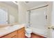 Clean bathroom with tub, shower, and updated vanity at 19873 E Vassar Ave, Aurora, CO 80013