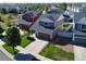 Aerial view of a neighborhood with a two-story house at 20768 Randolph Pl, Denver, CO 80249