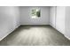 Spacious bedroom with neutral carpeting and large window at 5670 S Lowell Blvd, Littleton, CO 80123