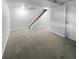 Unfinished basement area with carpeted floor at 5670 S Lowell Blvd, Littleton, CO 80123