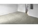 Spacious living room with neutral carpeting and ample natural light at 5670 S Lowell Blvd, Littleton, CO 80123