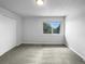 Spacious bedroom with neutral walls and carpeted floors at 5670 S Lowell Blvd, Littleton, CO 80123