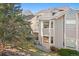 Exterior view of a two-story home with siding and a balcony at 9312 Miles Dr, Lone Tree, CO 80124