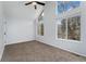 Bright bedroom with vaulted ceiling and large windows at 12525 E Tennessee Cir # E, Aurora, CO 80012