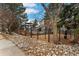 Fenced-in pet area with gravel and landscaping at 12525 E Tennessee Cir # E, Aurora, CO 80012