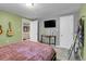 Charming basement bedroom with plush carpet and ample closet space at 3160 N Saint Paul St, Denver, CO 80205