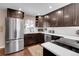 Updated kitchen featuring stainless steel appliances and white subway tile at 3160 N Saint Paul St, Denver, CO 80205