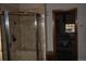 Bathroom with a large walk-in shower and tile flooring at 13927 Dancing Bear Trl, Littleton, CO 80127
