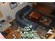 Open living area with a sectional sofa and a view of the dining area at 13927 Dancing Bear Trl, Littleton, CO 80127