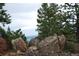 Spectacular aerial view showcasing expansive mountain ranges and lush greenery at 13927 Dancing Bear Trl, Littleton, CO 80127