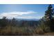 Expansive mountain vista with a stunning view of snow-capped peaks at 13927 Dancing Bear Trl, Littleton, CO 80127
