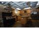 Basement kitchen with stone wall and stainless steel appliances at 13927 Dancing Bear Trl, Littleton, CO 80127