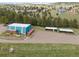 Aerial view of property with multiple structures at 1044 S Grapevine Rd, Golden, CO 80401